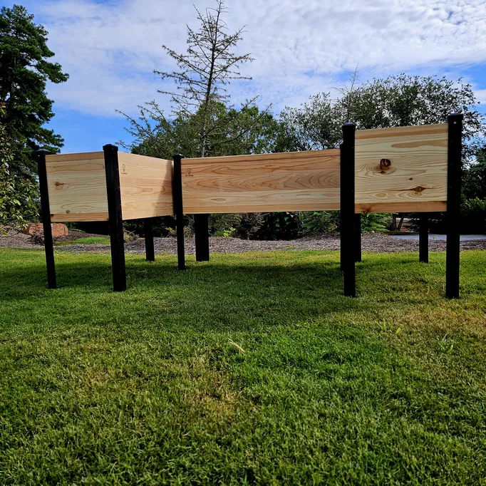 Elevated cedar planter box for comfortable gardening and cleaner outdoor spaces