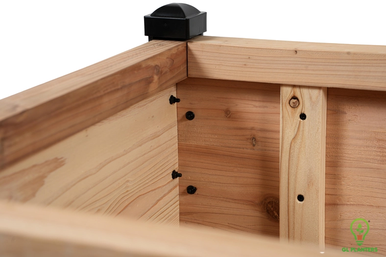 Modern elevated cedar garden bed showcasing premium 2-inch trim and high-end wood craftsmanship.